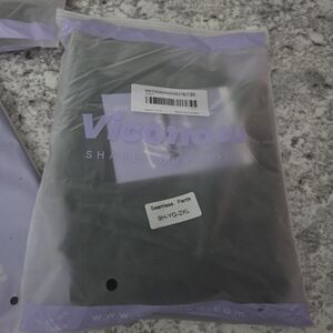 New In Bag Viconow Green Seamless Leggings. 90% nylon 10% spandex Sz 2x